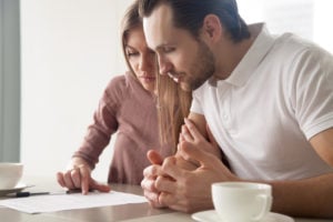 married couple during closing process